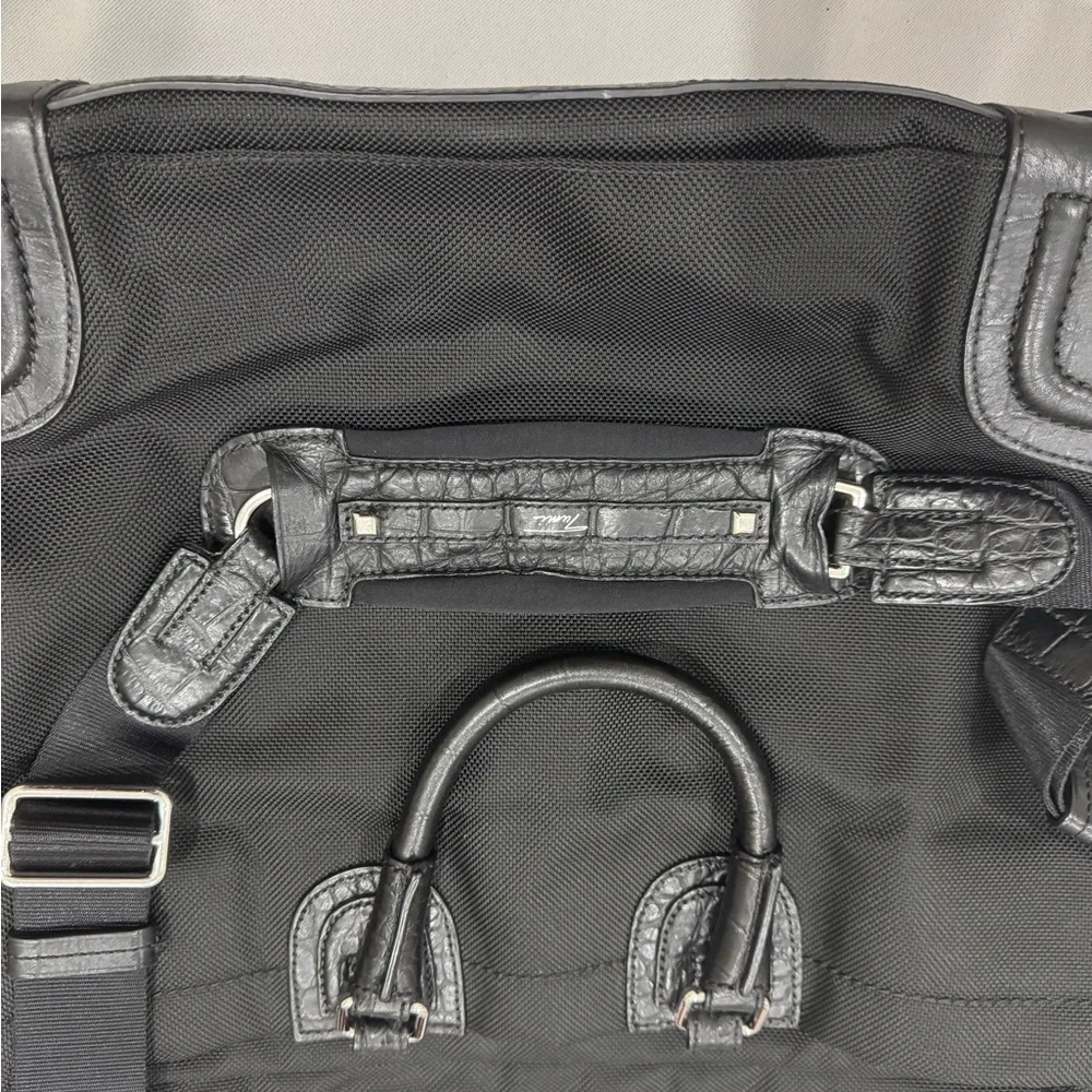 Tumi Travel Black Briefcase with Leather Finish and Metal Accents
